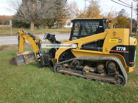 caterpillar backhoe attachment for skid steer|cat skid steer milling attachment.